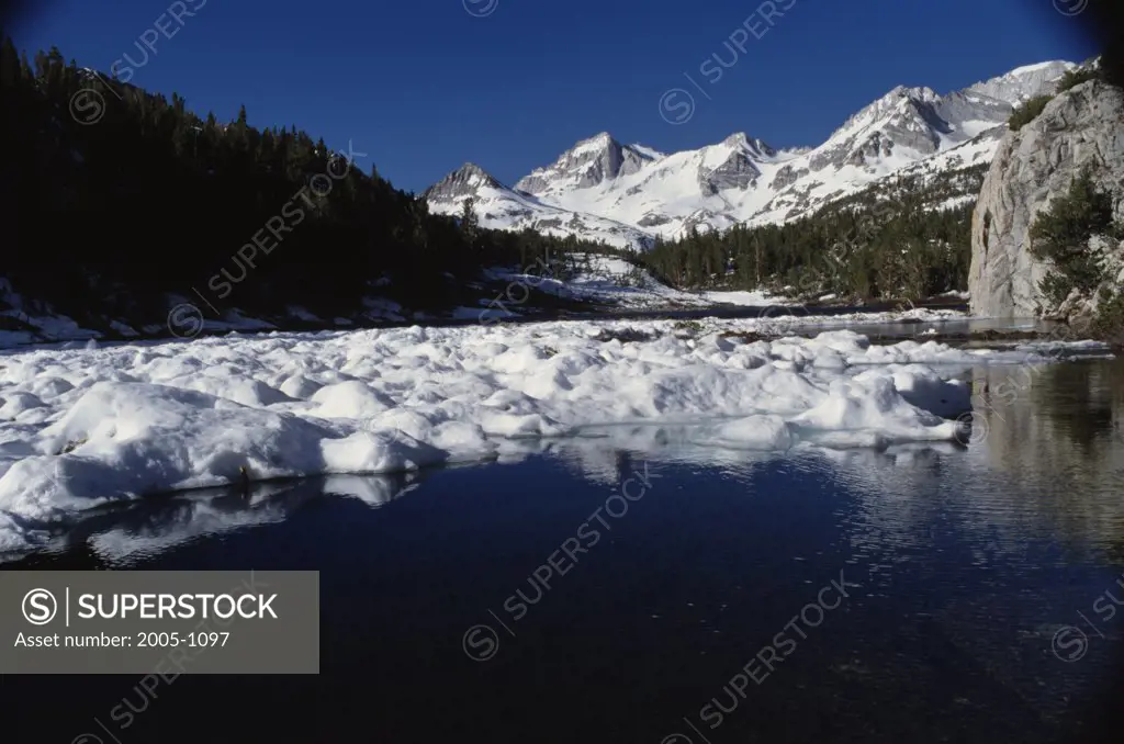 Panoramic view of snow covered mountains, Mack Lake, Californian Sierra Nevada, California, USA