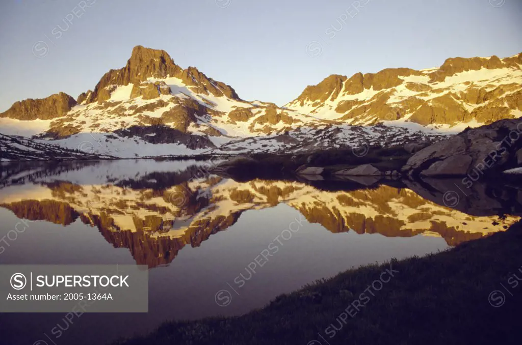 Reflection of mountains in water, Banner Peak, Californian Sierra Nevada, California, USA