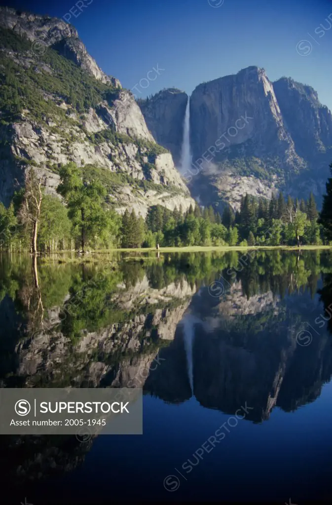 Reflection of a waterfall in a lake, Upper Yosemite Falls, Yosemite National Park, California, USA