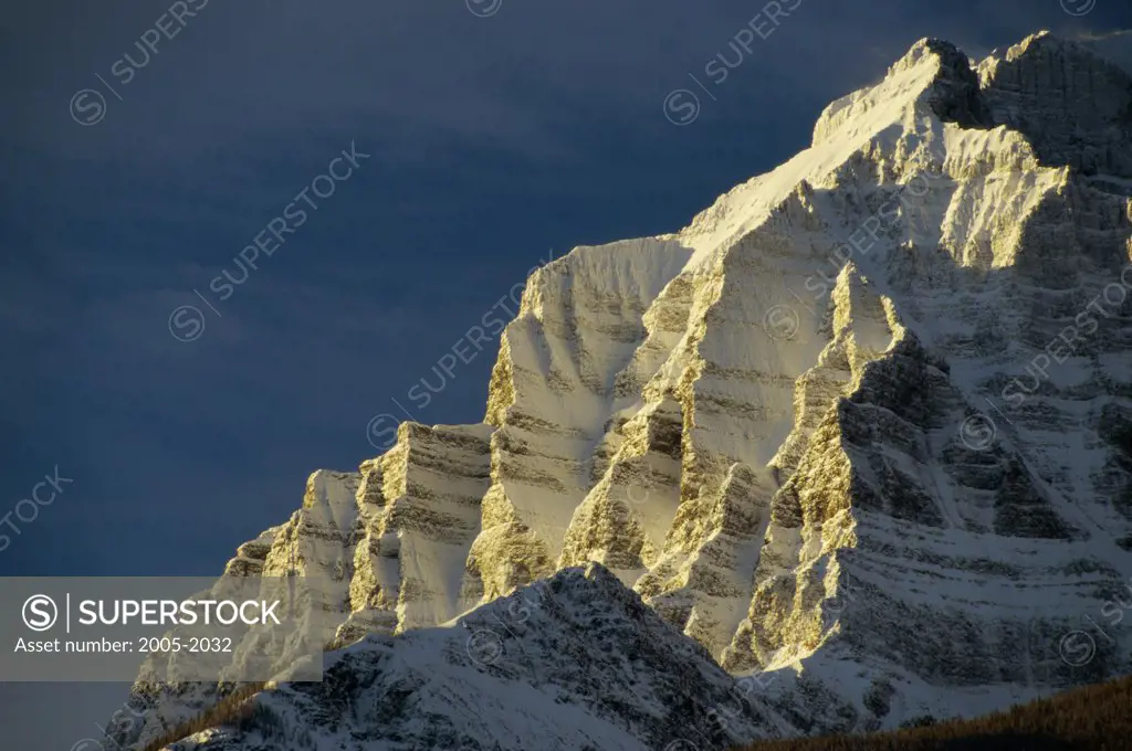 Low angle view of a snow covered mountain, Mount Temple, Banff National Park, Alberta, Canada