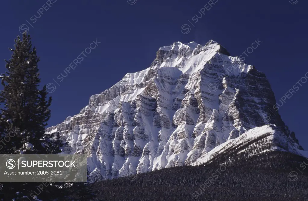 Low angle view of a snowcapped mountain, Mount Temple, Banff National Park, Alberta, Canada