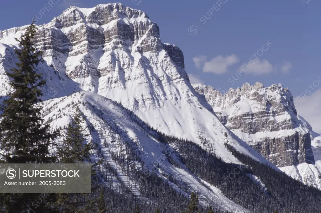 Low angle view of snowcapped mountains, Waputik Range, Banff National Park, Alberta, Canada