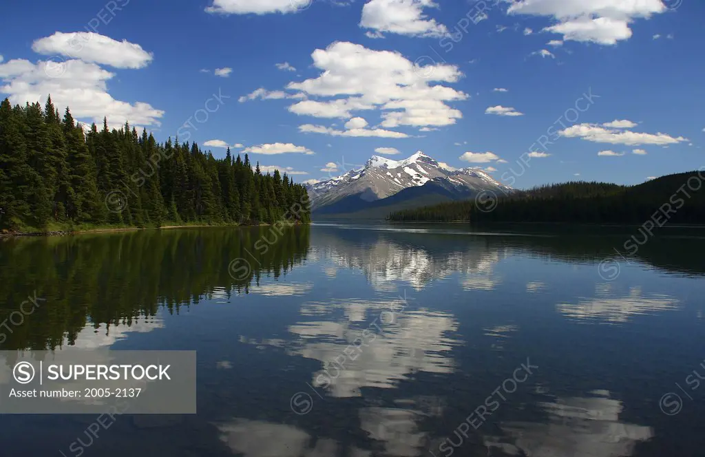 Reflection of clouds in water, Maligne Lake, Jasper National Park, Alberta, Canada