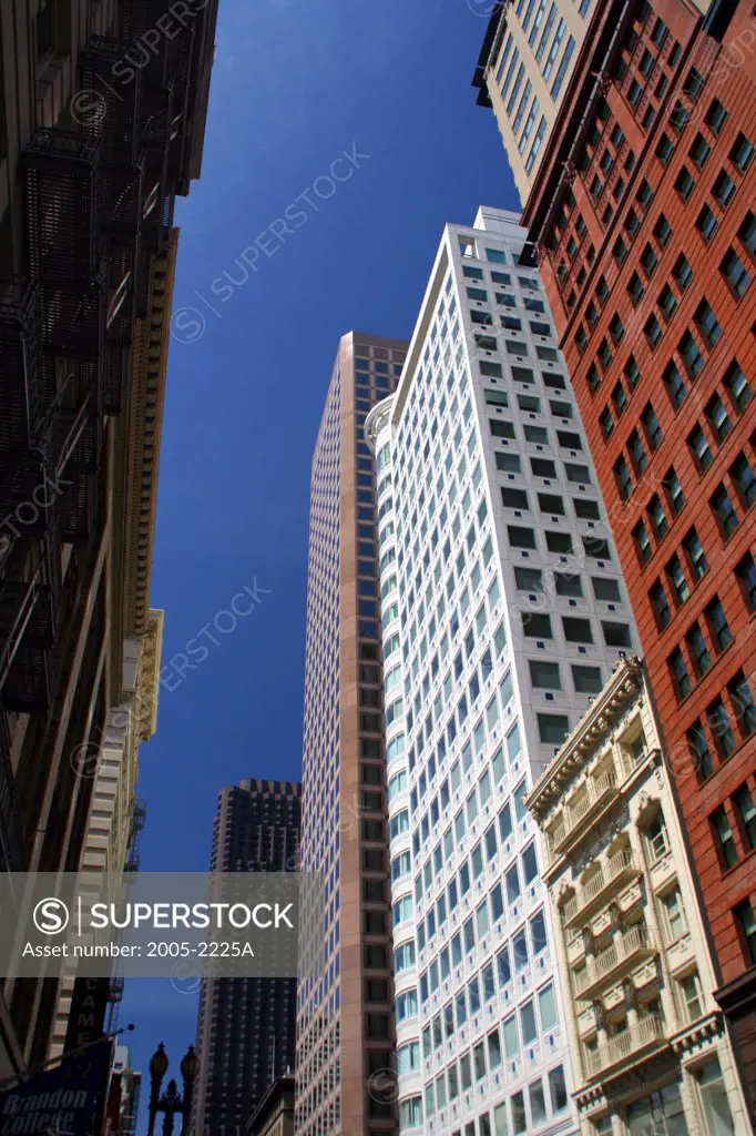 Low angle view of buildings in a city, Market Street, San Francisco, California, USA