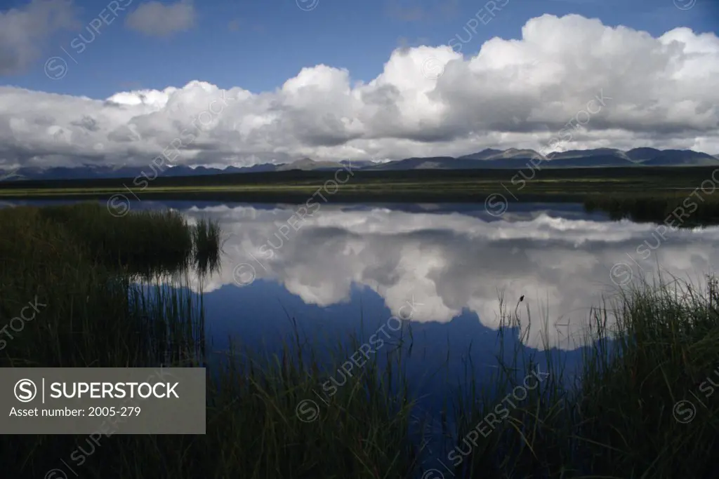 Reflection of clouds in the lake, Kettle Lake, Denali Highway, Alaska, USA