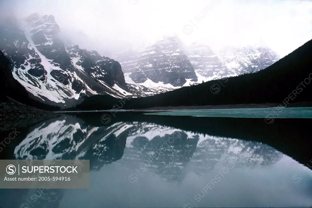 Reflection of a mountain in a lake, Wenkchemna Peak, Morraine Lake, Banff National Park, Canada