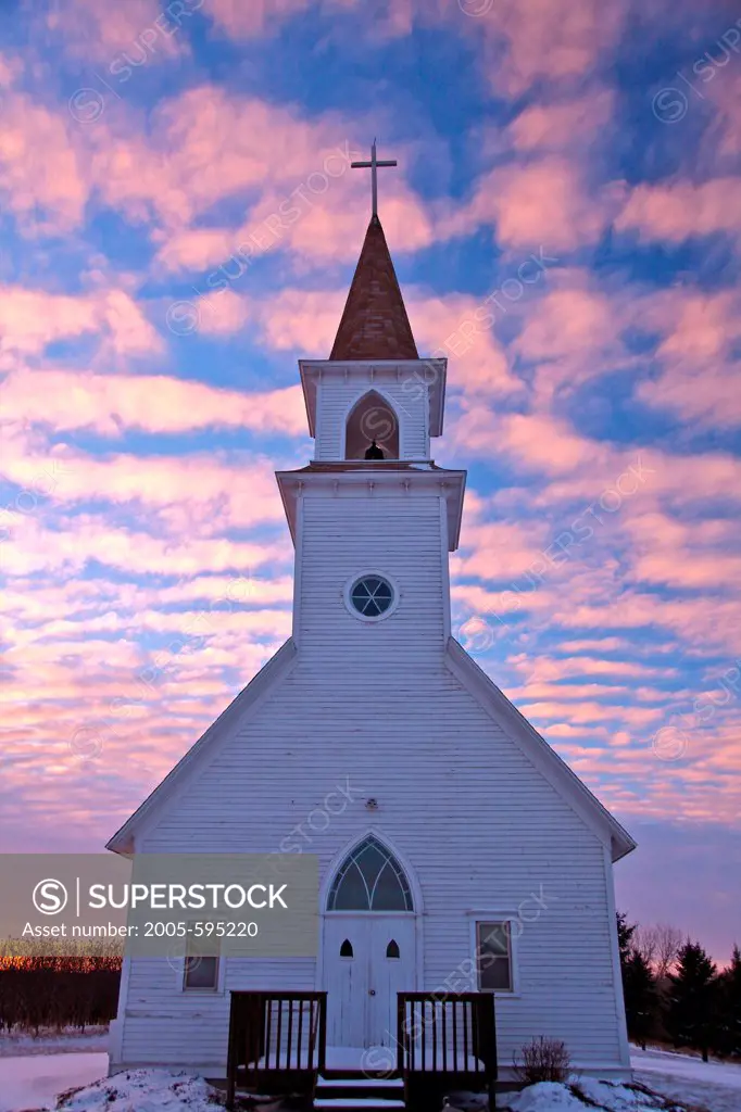 USA, Minnesota, Winter sunset over Country Church