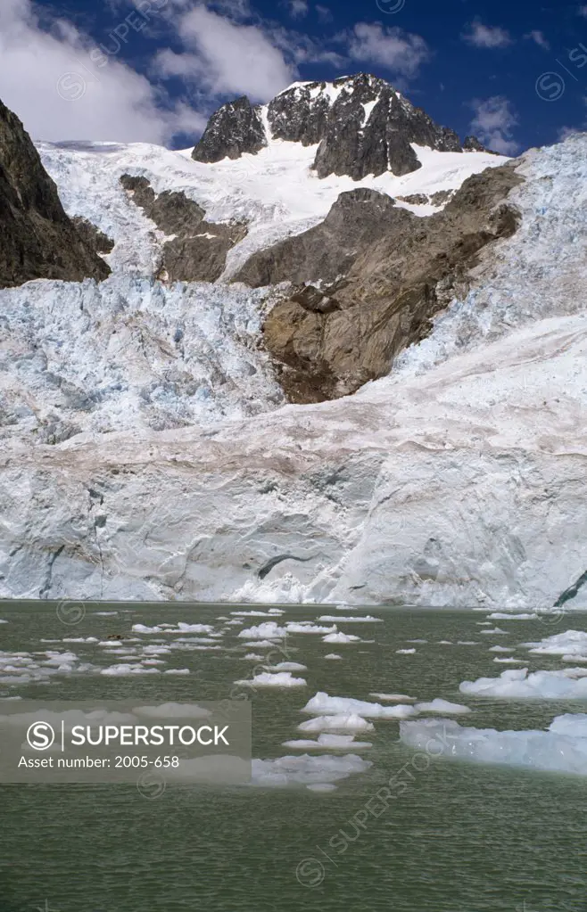 Low angle view of snow covered mountains, Northwestern Glacier, Kenai Fjords National Park, Alaska, USA