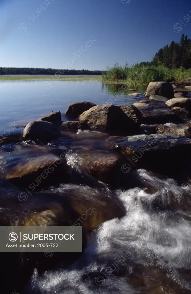 Rocks in a lake, Lake Itasca, Minnesota, USA
