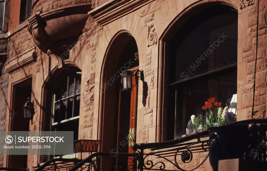 Facade of a brownstone house, New York City, New York, USA