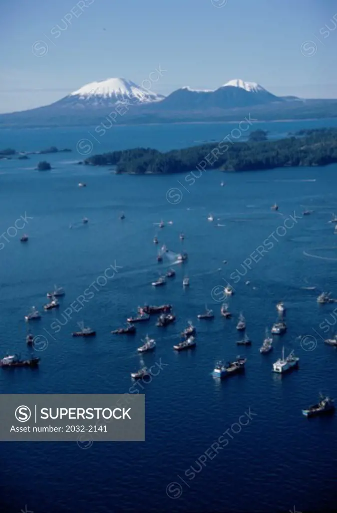 Aerial view of boats in the sea with a mountain in background, Mount Edgecumbe, Sitka Sound, Alaska, USA