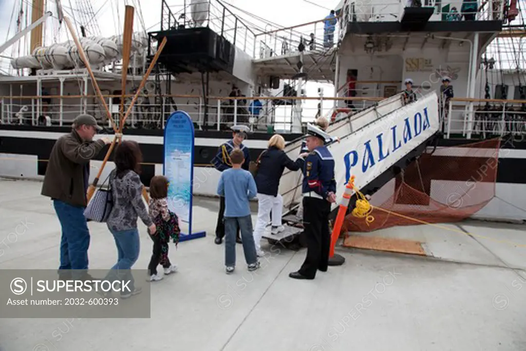 USA, Alaska, Sitka, Midshipmen and visitors at STS Pallada, Russian training sailingship docked