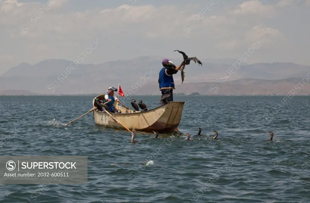 China, Yunnan, Lake Erha, fishing boats on lake