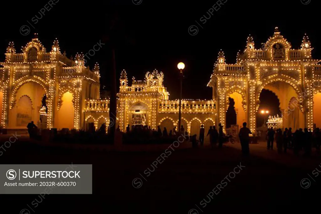 India, Karnataka, Mysore, Palace illuminated at night