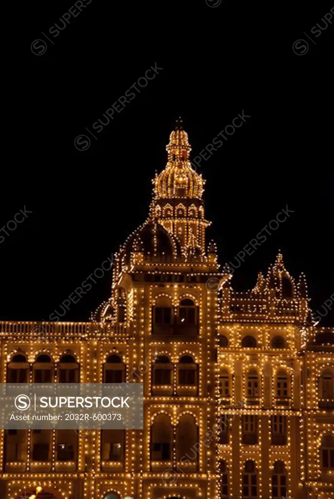 India, Karnataka, Mysore, Palace illuminated at night