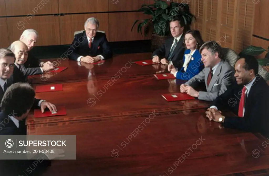 Business executives talking in a meeting