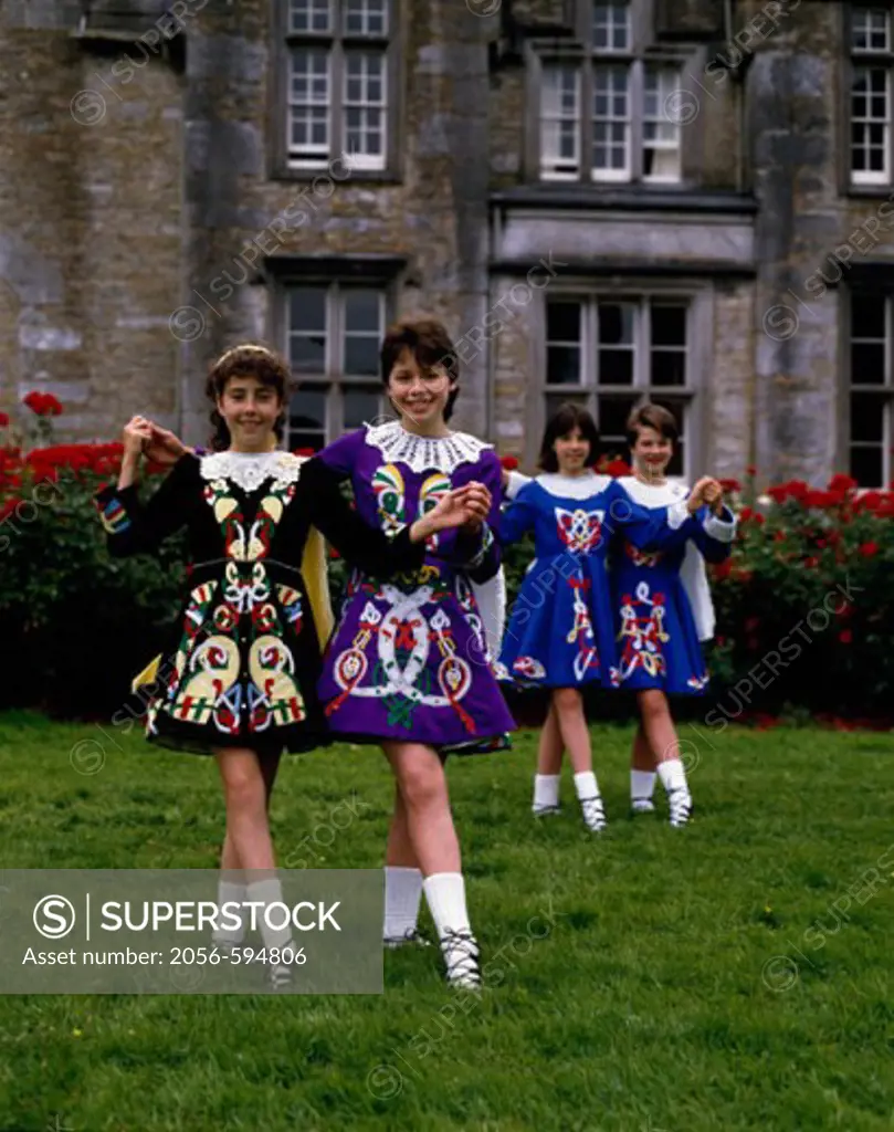 Four teenage girls dancing, Ireland