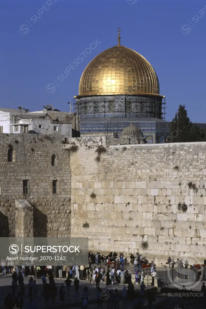 Israel, Jerusalem, Dome of the Rock, Wailing Wall, devotees praying in front of stone wall