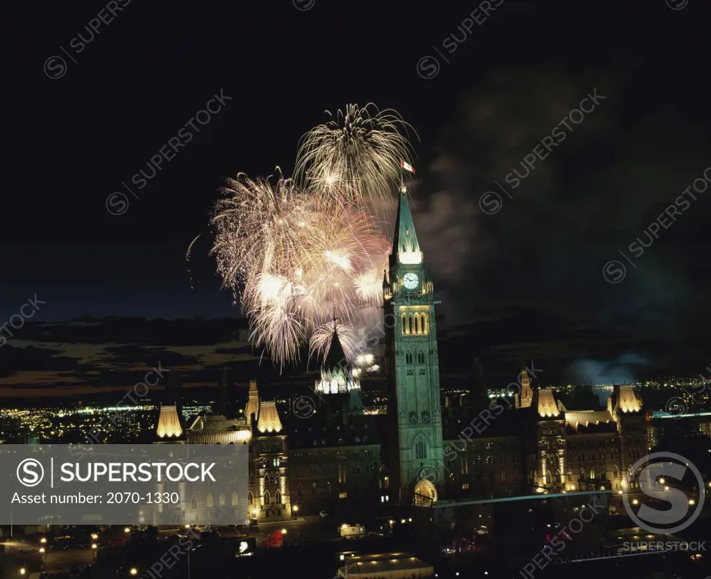 Fireworks over a city, Canada Day, Parliament Hill, Ottawa, Canada