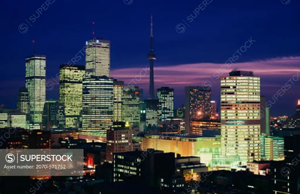 Skyscrapers lit up at night, Eaton Centre and CN Tower, Toronto, Ontario, Canada