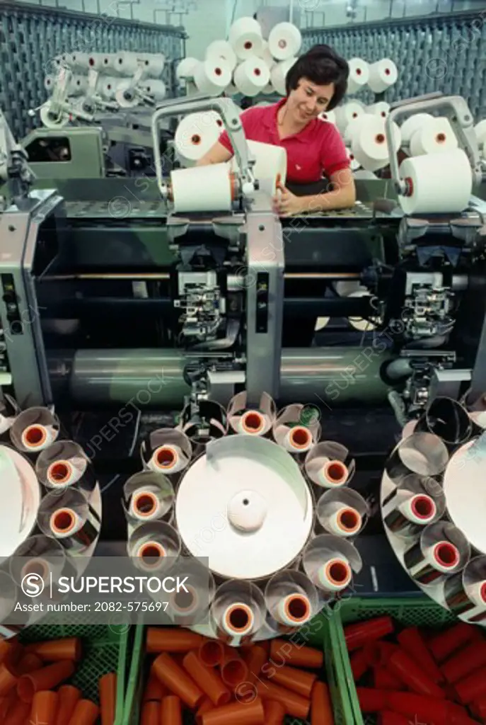 Murata Rewinders Reclaim Yarn. Splicing and Inspecting it before Winding into "Cheeses" of Yarn