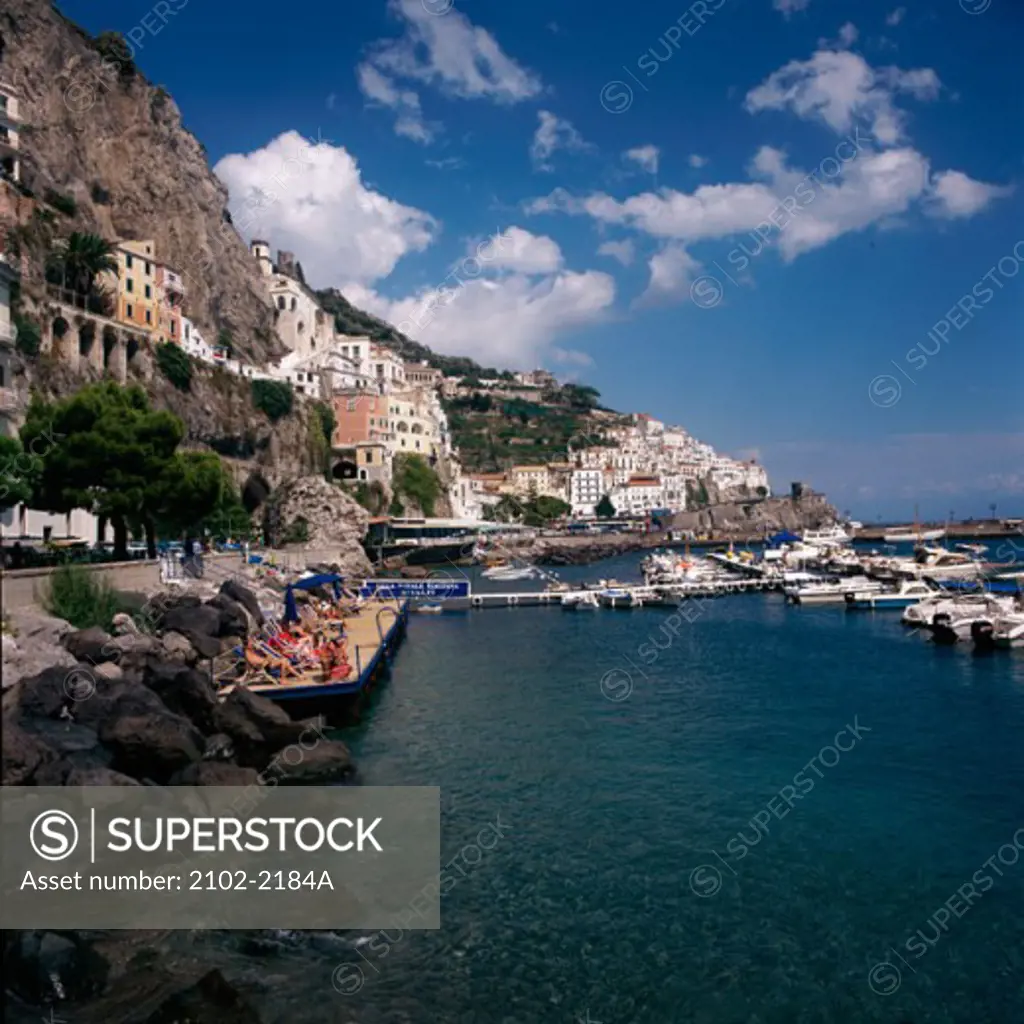 Boats docked at the coast, Amalfi, Italy