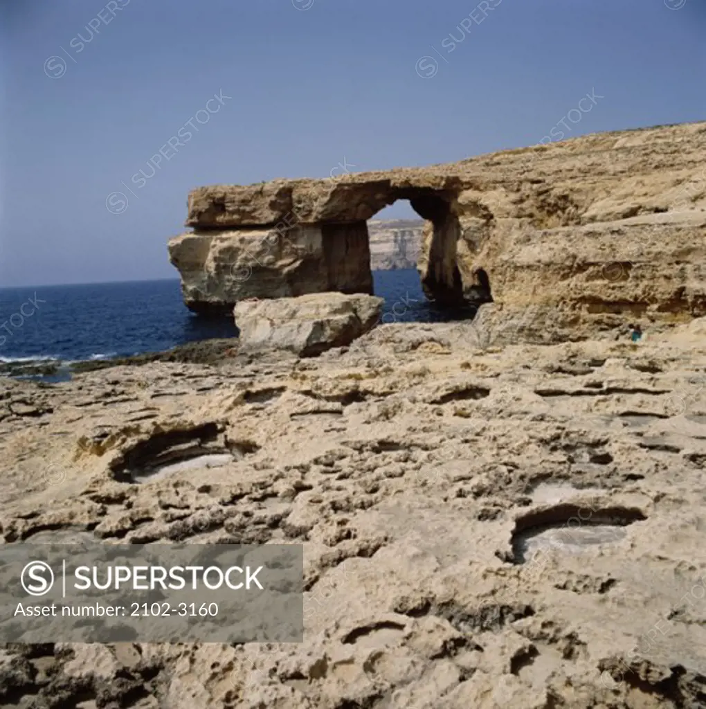 Natural bridge on a coast, Gozo, Malta