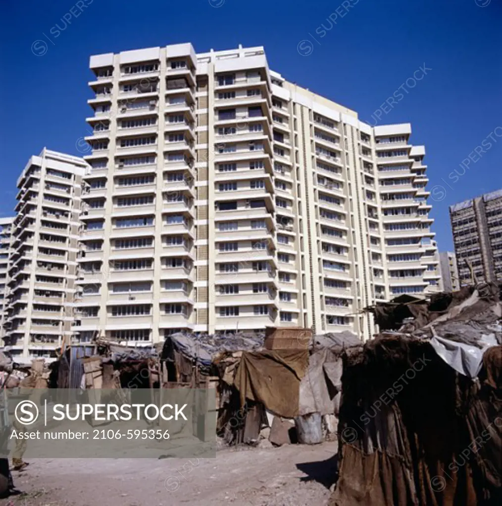 Squatters Huts  High Rise Buildings in the Background Bombay India