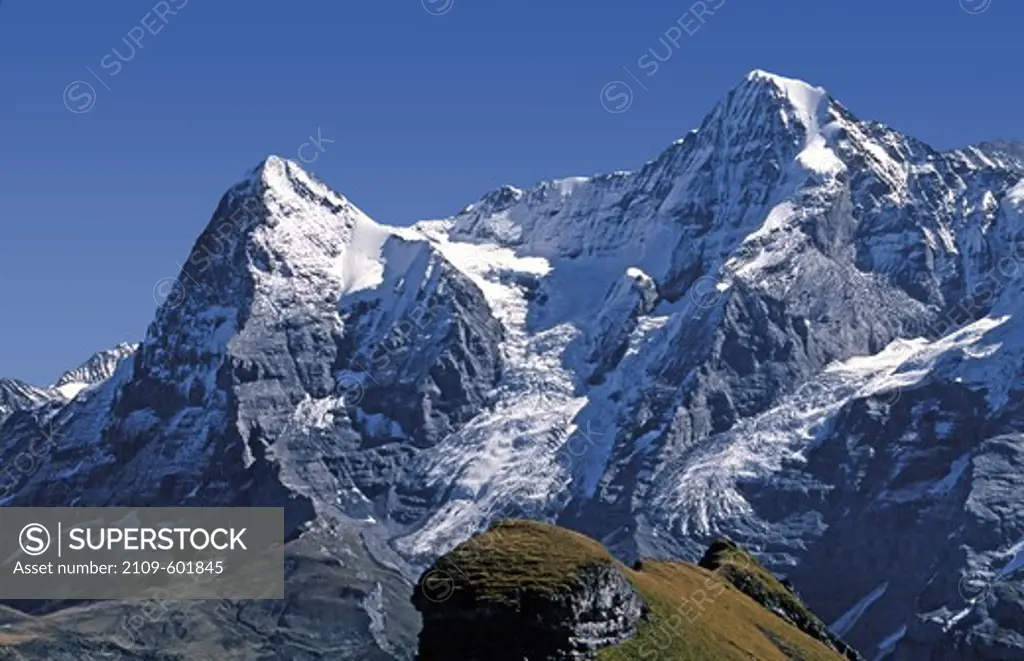 Low angle view of mountain peaks, The Eiger and The Monch from near the Schilthorn above Murren, Switzerland