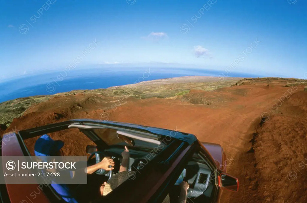 High angle view of a man in a convertible car