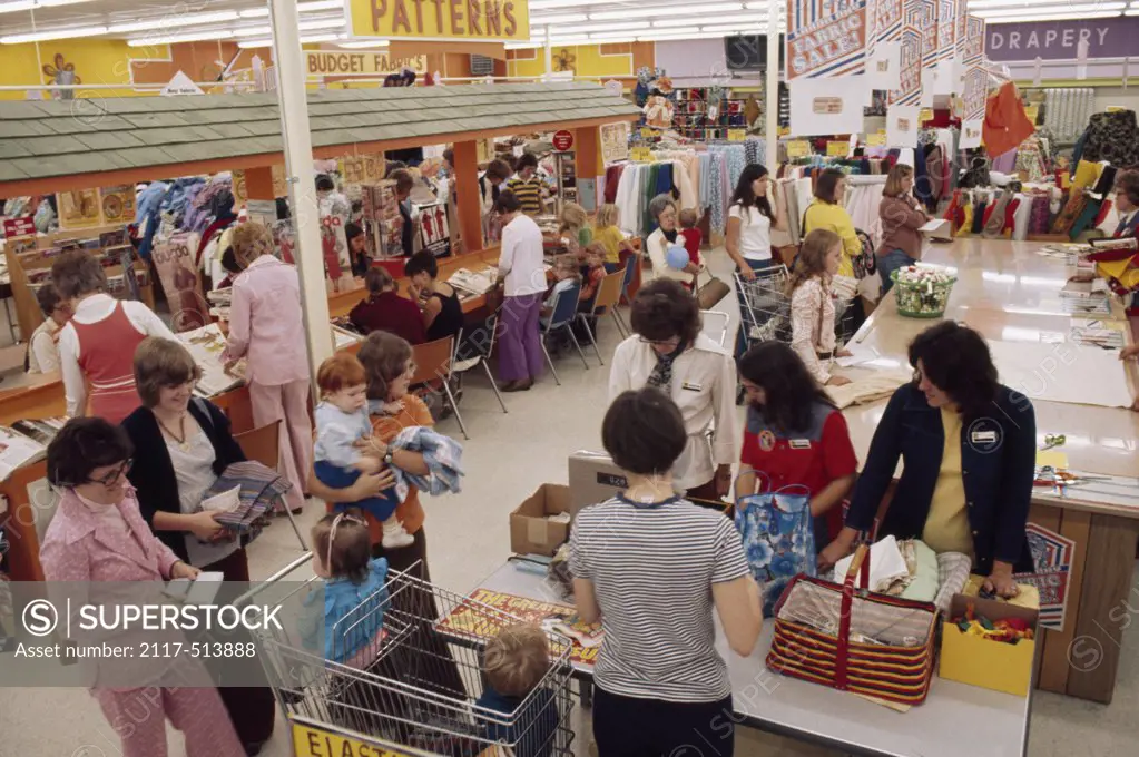 Group of people shopping in a fabric store