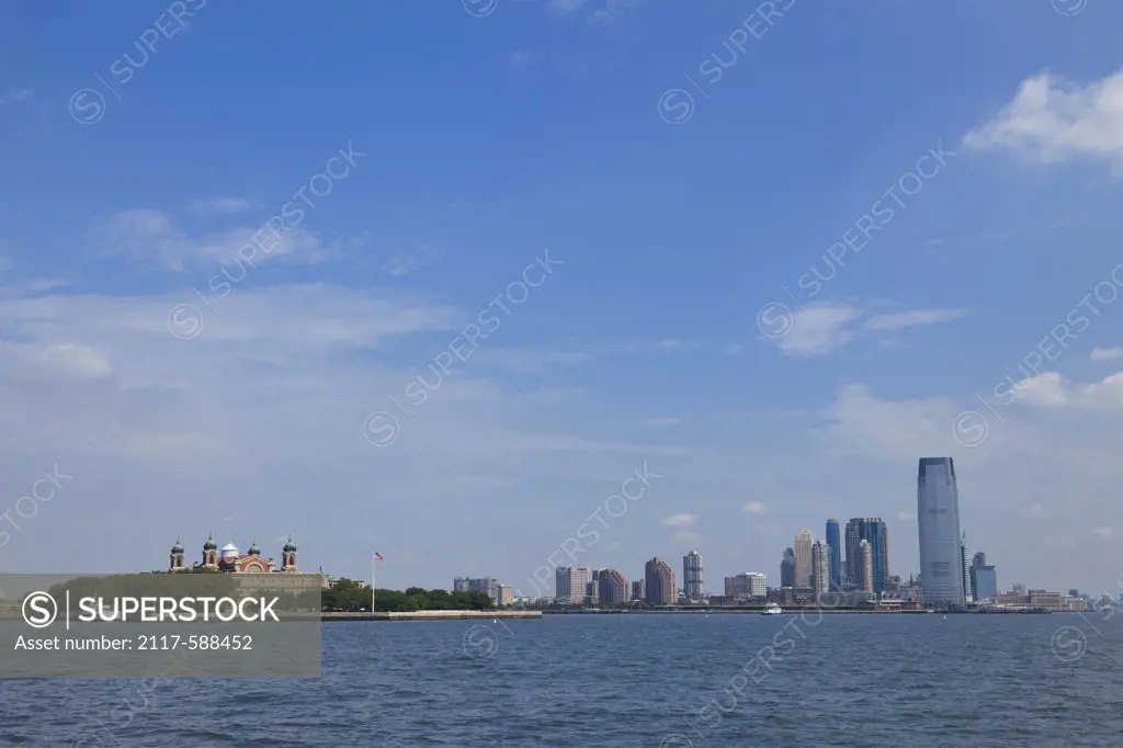 USA, New York Harbor, Ellis Island on left and Jersery City on right