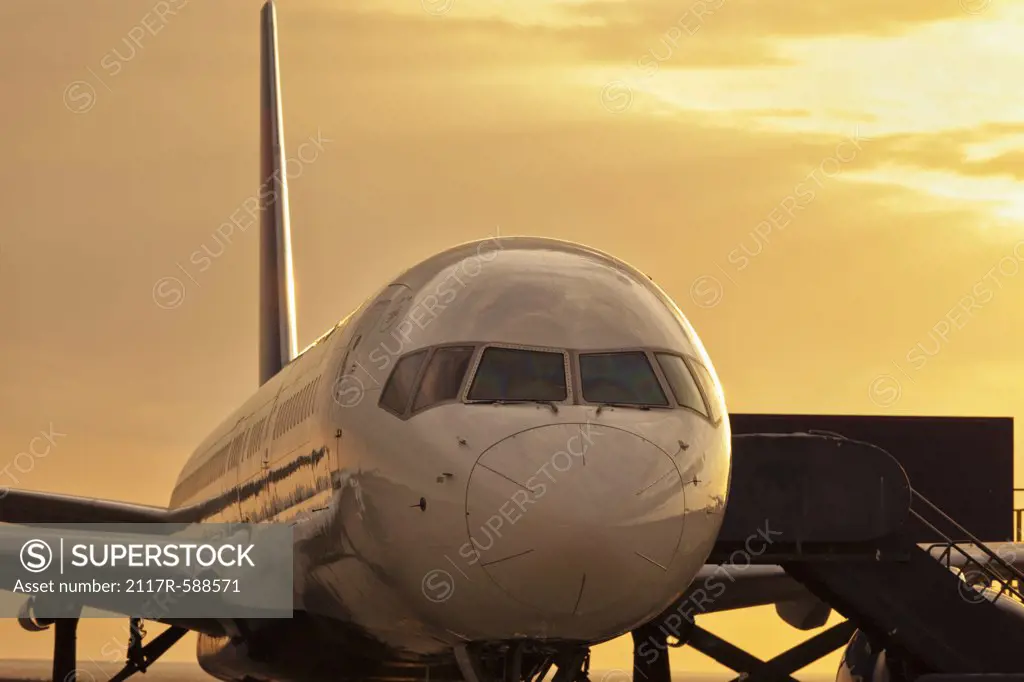 USA, Hawaii, Keahole, Kona International Airport, Close up of Boeing 737 at sunset