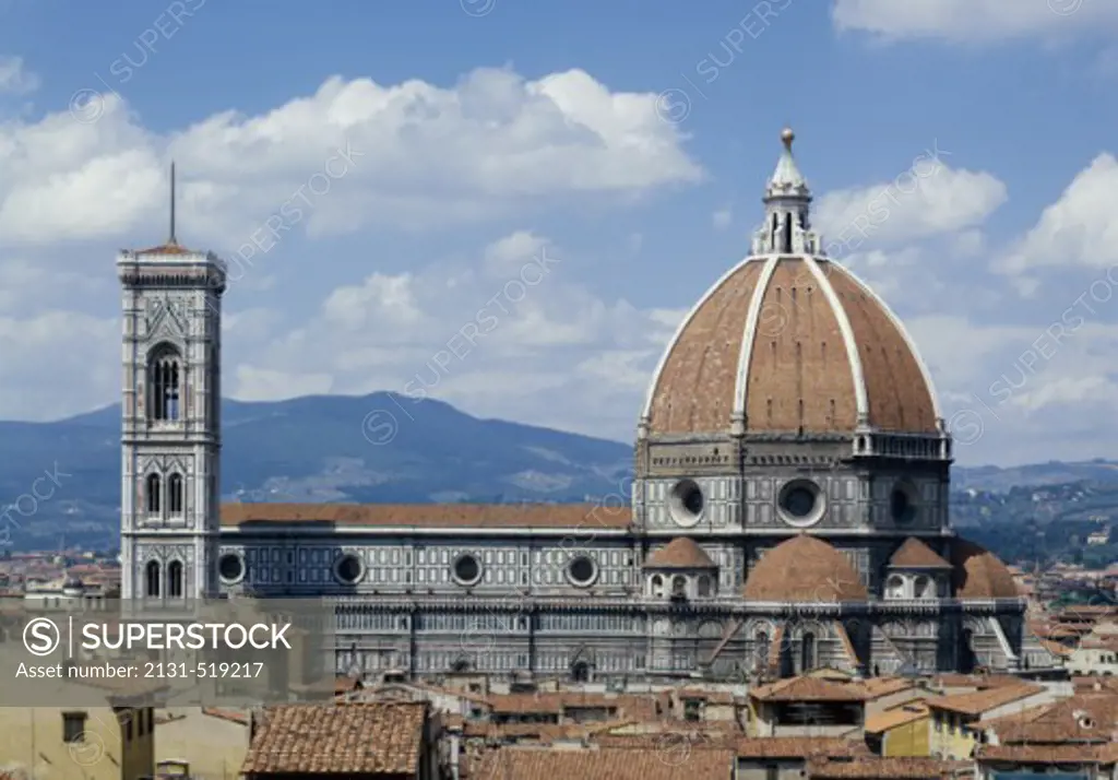 High section view of a cathedral and a bell tower, Duomo Santa Maria del Fiore, Campanile di Giotto, Florence, Italy