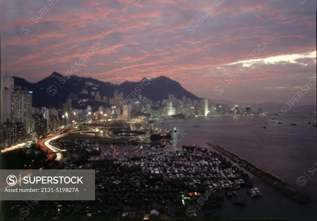 Aerial view of a city lit up at night, Hong Kong, China