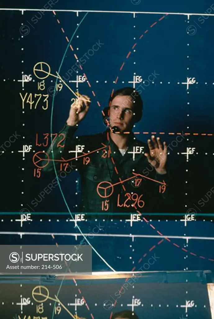 A U.S. Army Soldier Makes Notations on an Air Operations Radar Plot Board (October 1972)