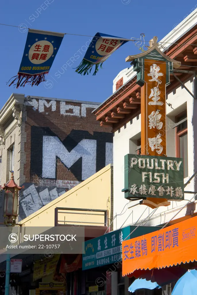 Low angle view of a banner hanging outside a building, Chinatown, San Francisco, California, USA