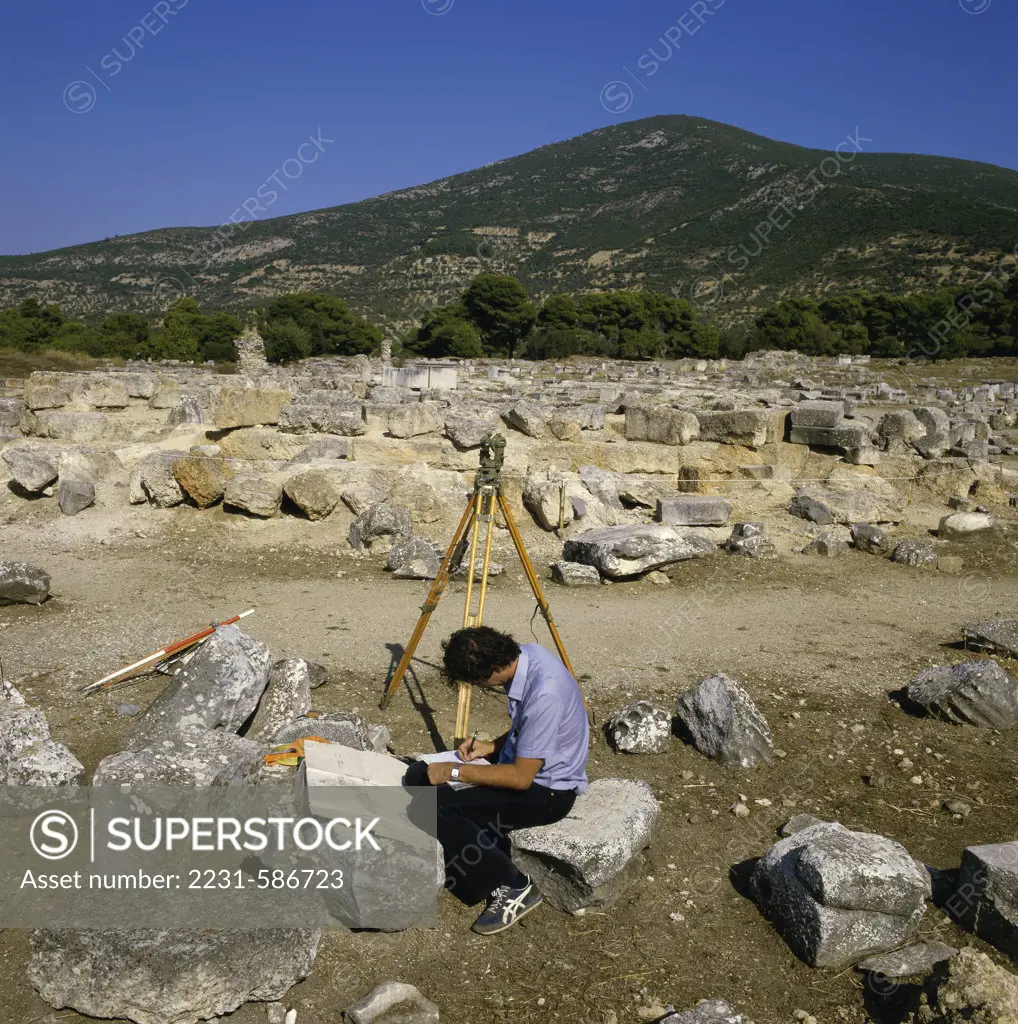 Archeologist in The Tholos Epidaurus Greece