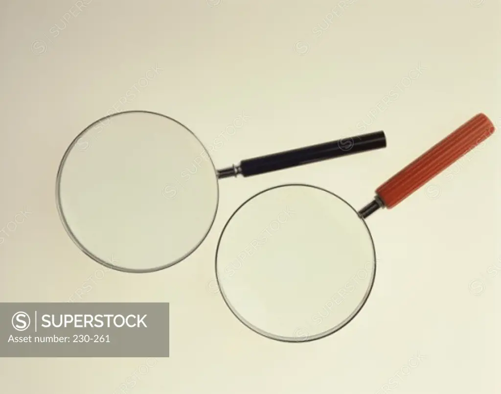 Close-up of two magnifying glasses