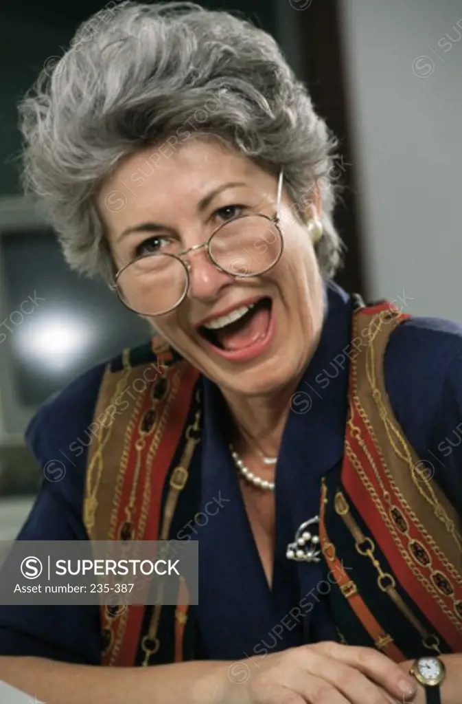 Close-up of a businesswoman laughing