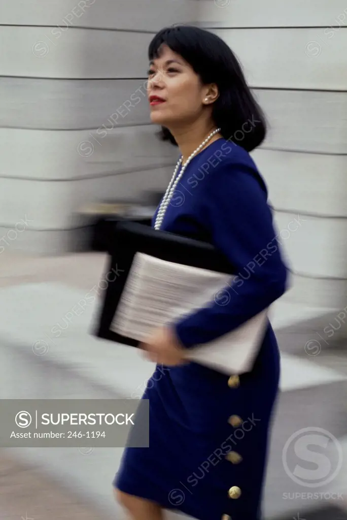Businesswoman carrying a portfolio