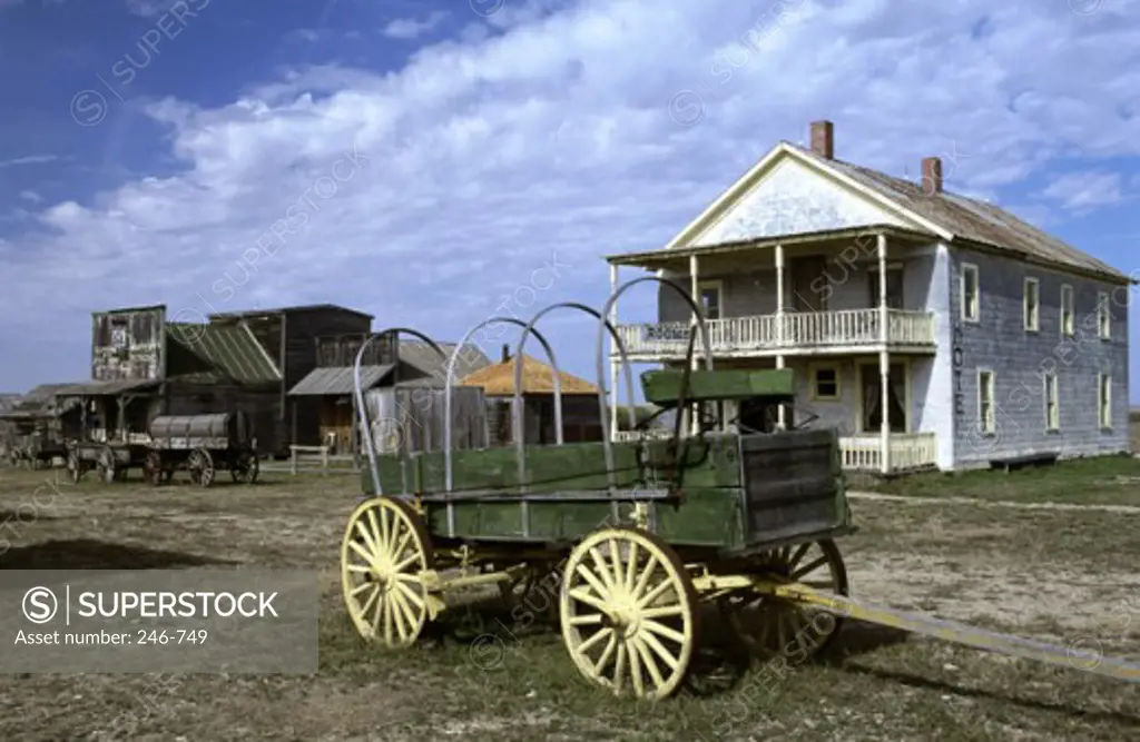 Cart in front of a building, 1880 Town, South Dakota, USA