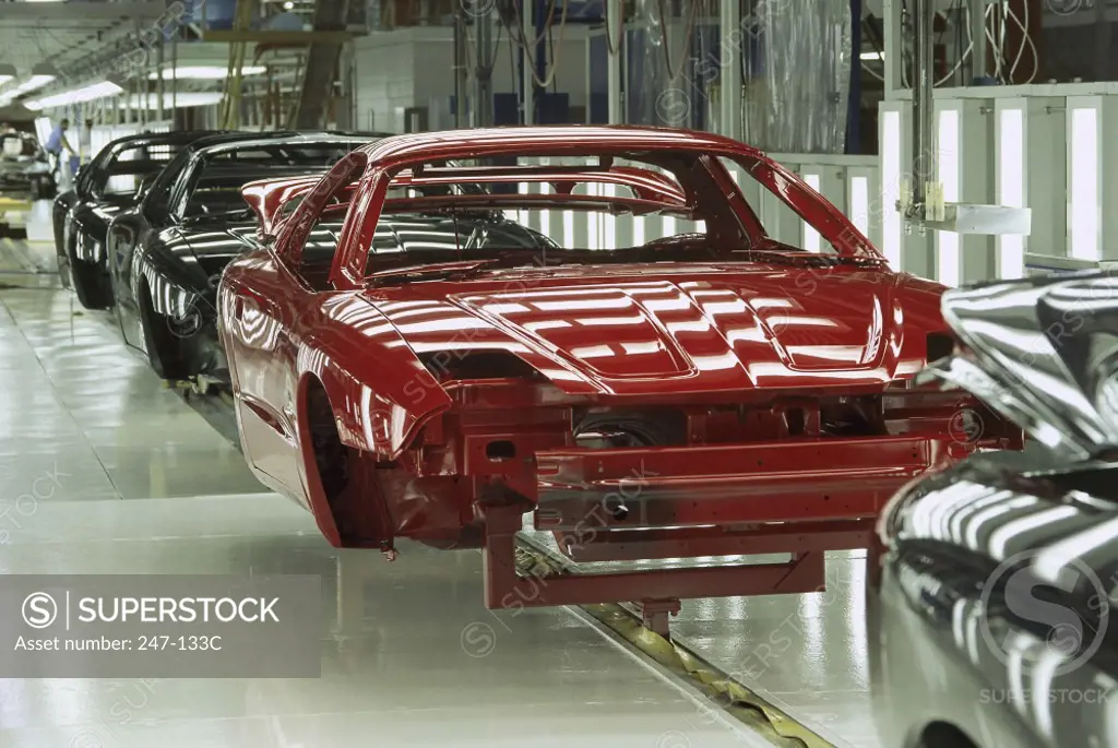 Cars on the assembly line at a factory