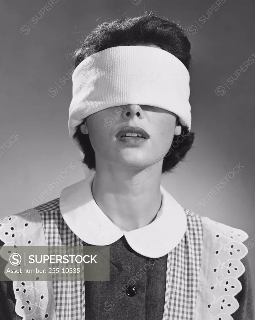Close-up of a young woman blindfolded
