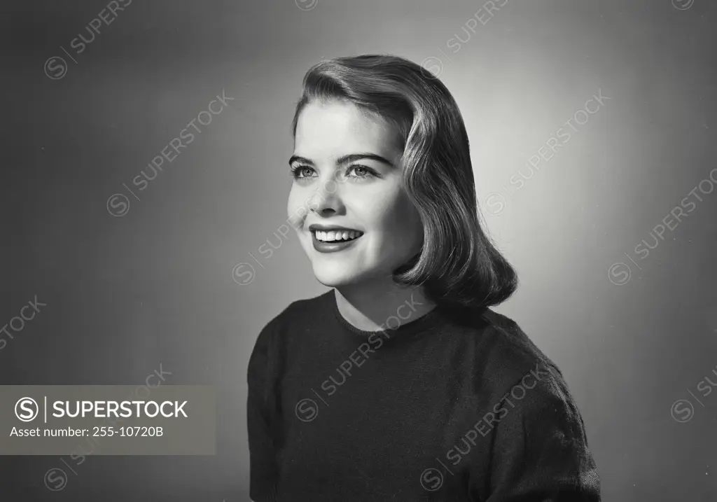 Vintage Photograph. Portrait of woman in casual blouse. Frame 2