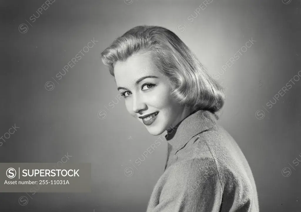 Vintage Photograph. Portrait of woman in button blouse. Frame 3
