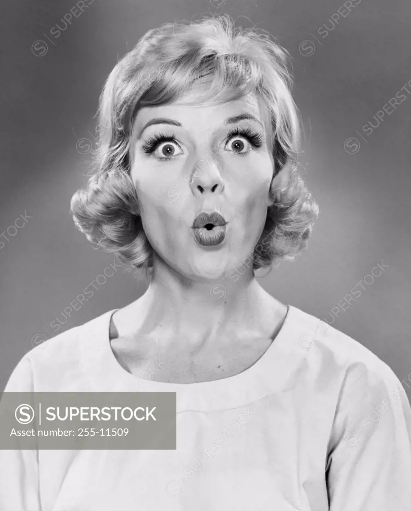 Portrait of a mid adult woman looking surprised
