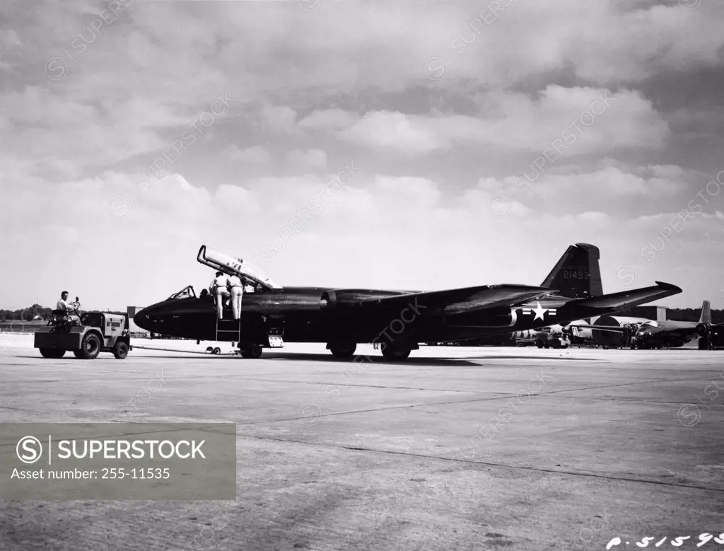 Side profile of a bomber plane on a military base, Martin B-57