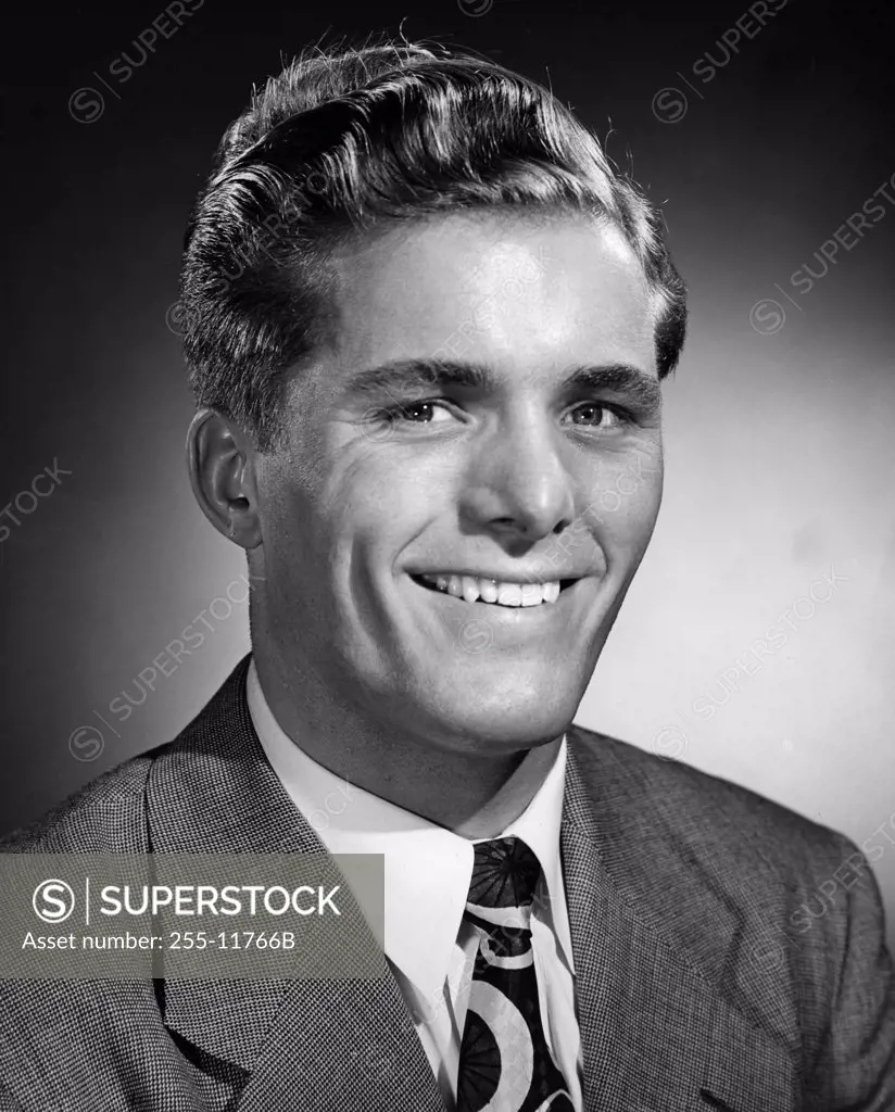 Studio portrait of businessman smiling