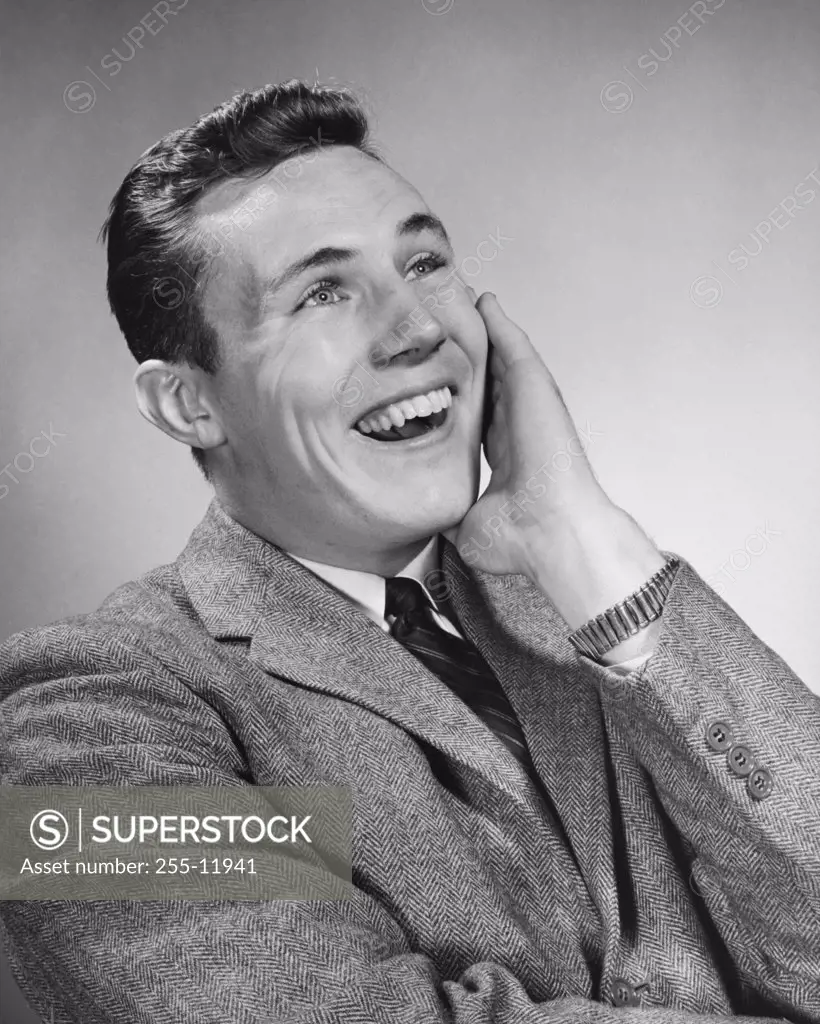 Close-up of a businessman laughing